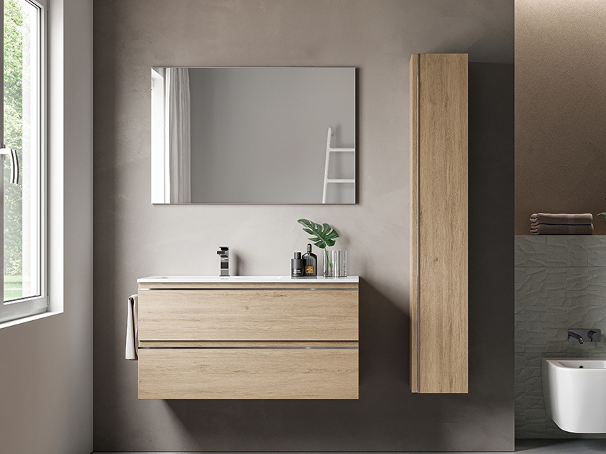 bathroom mirror and brown cabinet